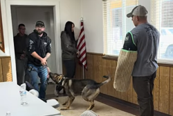 Yerington Police Department Officer Jared Adams with K9 Joker and Jeremy Hall volunteering for an arm hold.