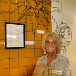Artist Virginia Dumas with her wall art. Photo by Roberta Bryant.