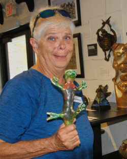 Artist with Ceramic Sculpture. By Roberta Bryant.
